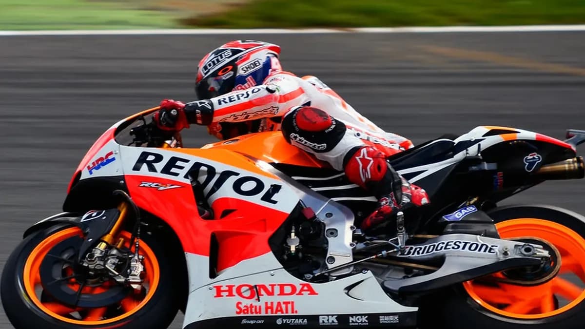 Marc Marquez riding a Repsol Honda race motorcycle in an archival action photograph