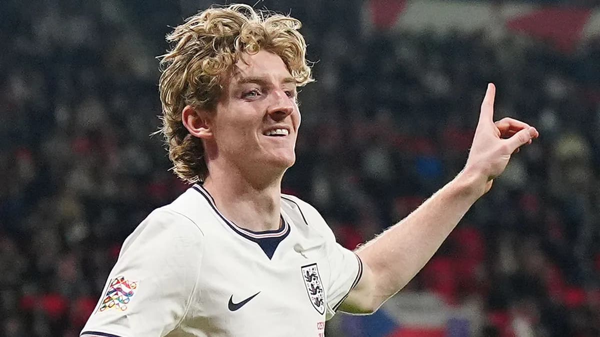 England forward Anthony Gordon smiles and points after scoring against Czechia in the UEFA Nations League at the Fortuna Arena in Prague