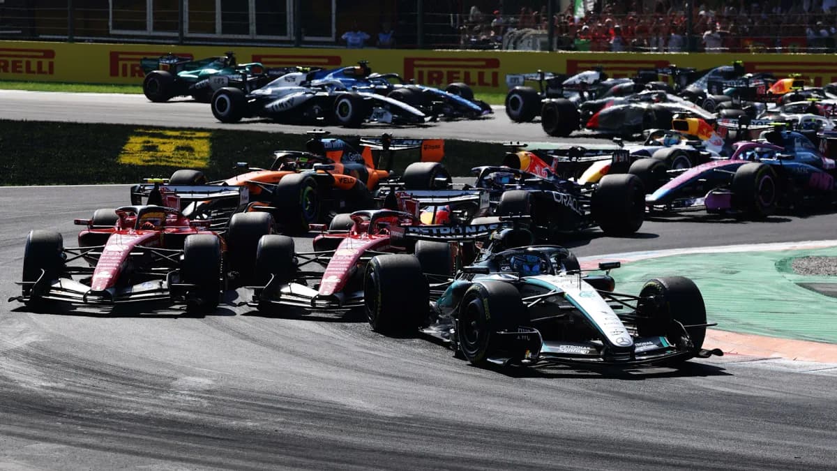 Formula 1 cars race through a corner at Monza in 2026