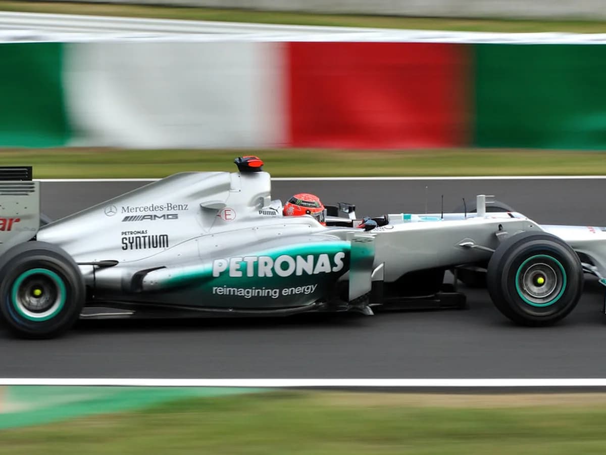F1 car crossing the finish line at the end of a Grand Prix