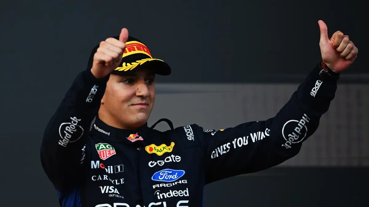 Isack Hadjar gives two thumbs up in a Pirelli podium cap and Red Bull race suit after finishing third in Baku
