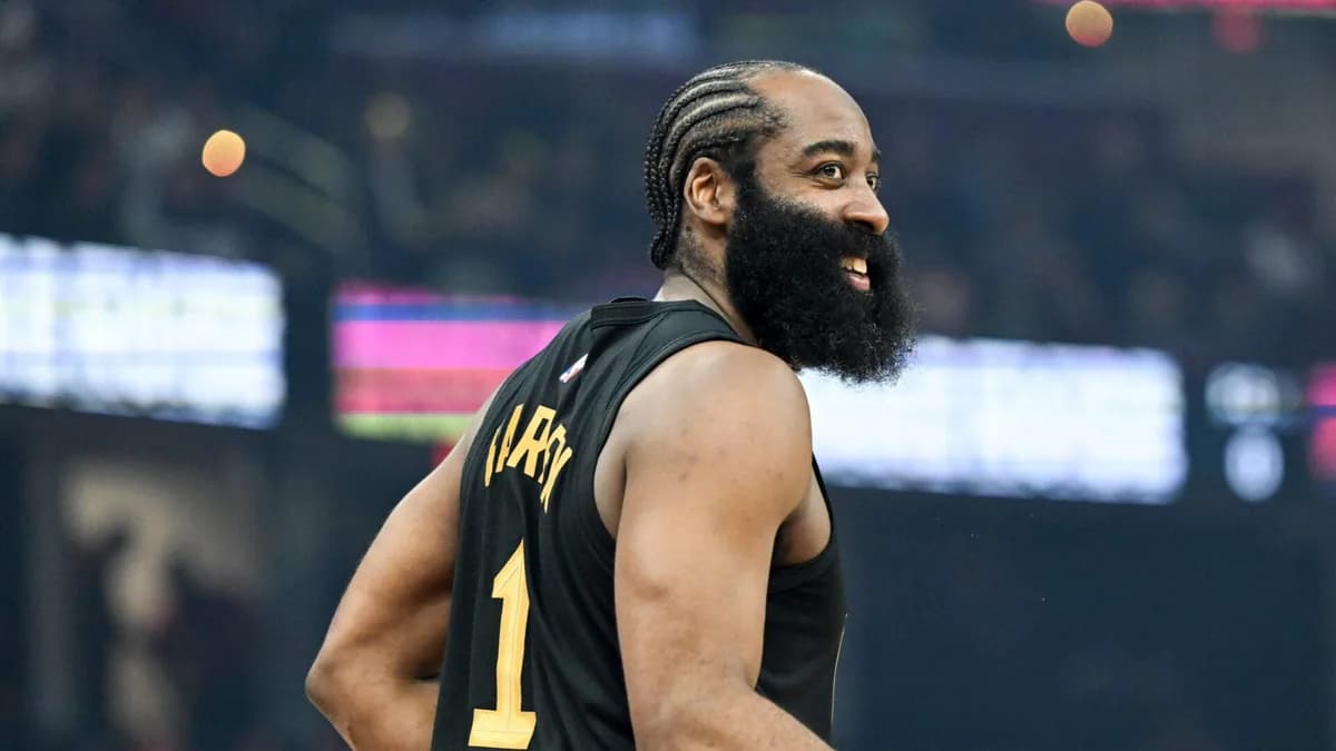 James Harden is pictured in profile wearing a black Cleveland Cavaliers number one jersey