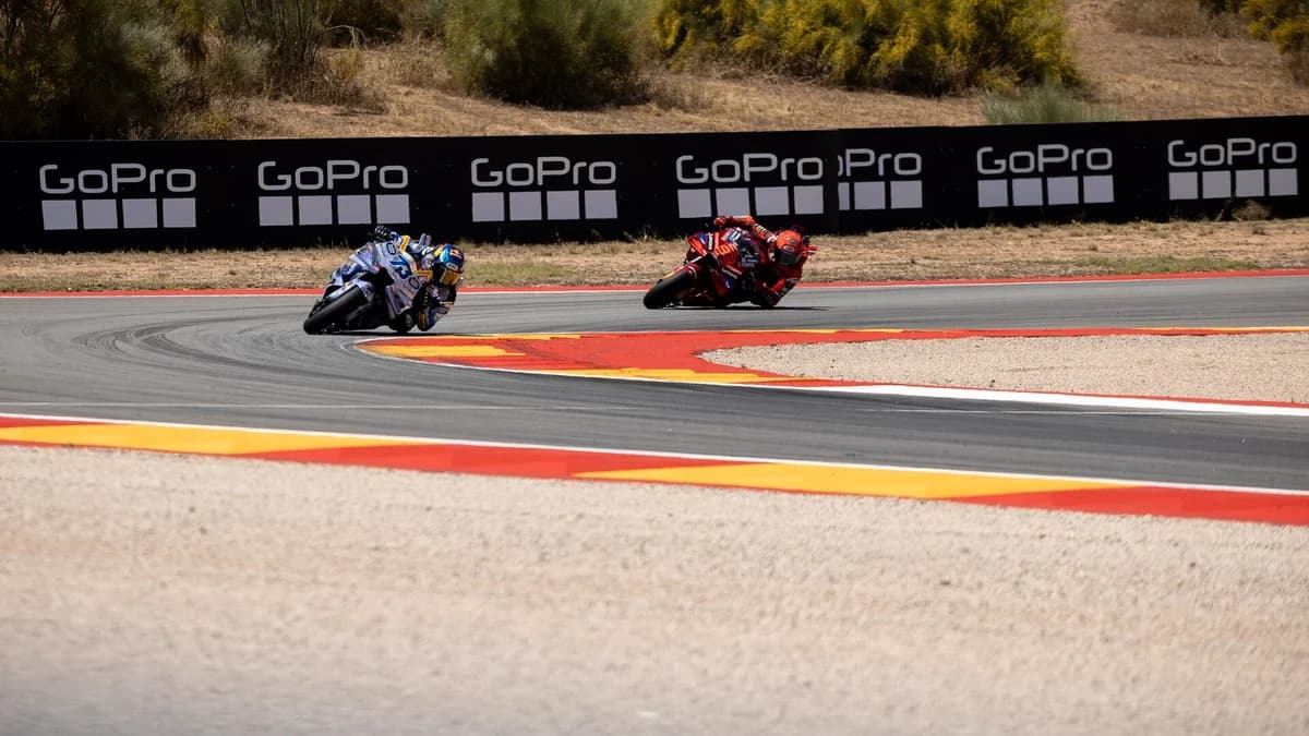 Alex Marquez leading Marc Marquez through a corner at the 2025 Aragon MotoGP