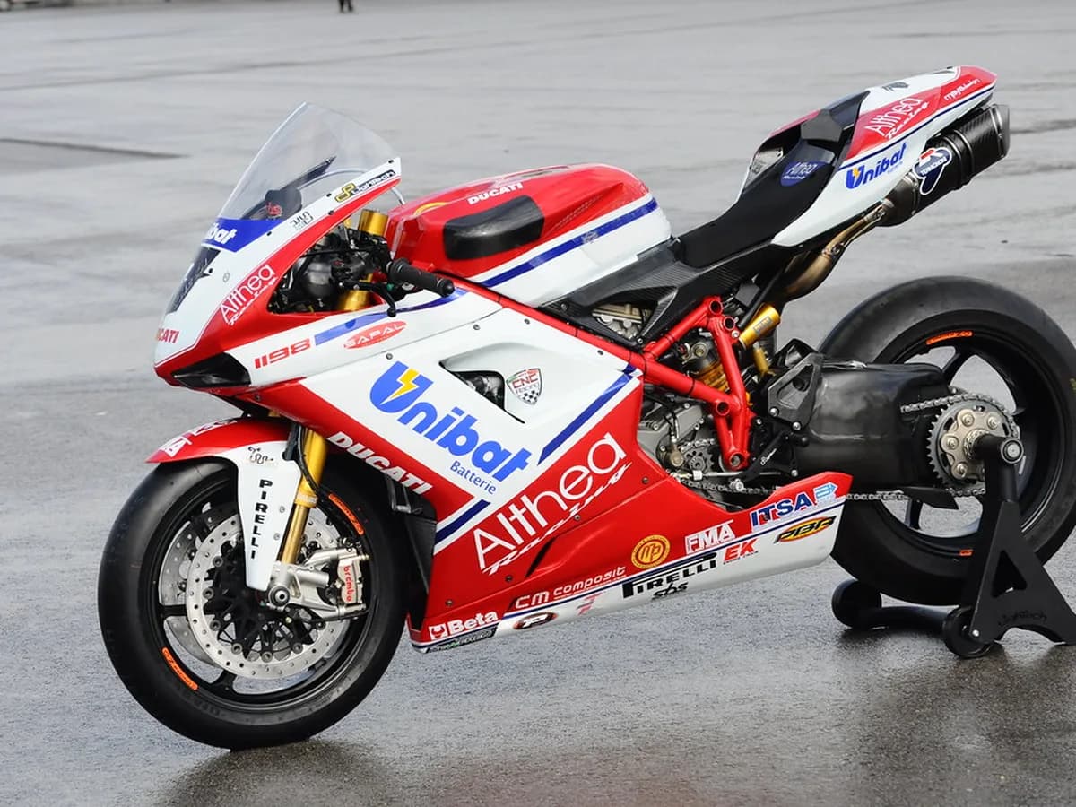 Superbike racing in close formation on track